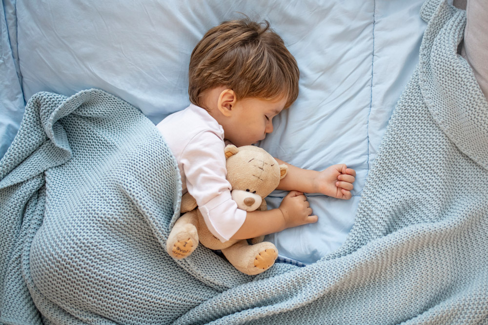 When is it safe for a baby to have a pillow UK?